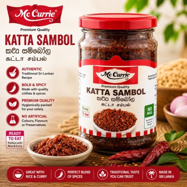 A glass jar of Mc Currie Katta Sambol next to a bowl of sambol and red chillies on a wooden table.