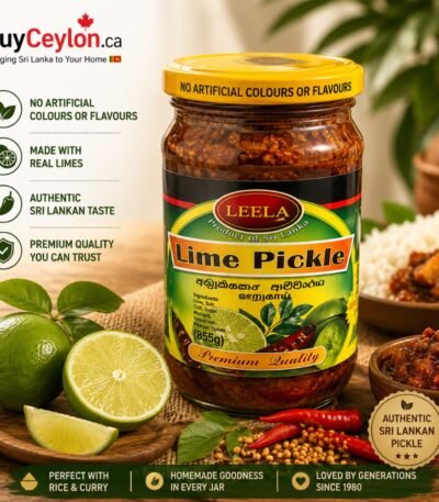 A glass jar of Leela Lime Pickle with a yellow lid, surrounded by fresh green limes, chili peppers, and traditional spices.