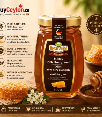 A 500g jar of Buram Honey with Honeycomb shown next to pieces of fresh honeycomb, white flowers, and a wooden honey dipper.