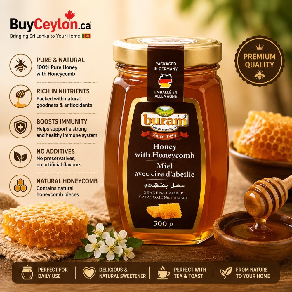 A 500g jar of Buram Honey with Honeycomb shown next to pieces of fresh honeycomb, white flowers, and a wooden honey dipper.